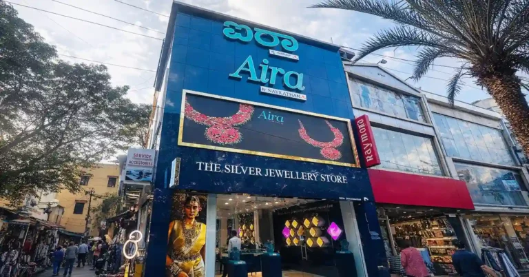 commercial building elevation installation done by sign boards maker for aira jewellers